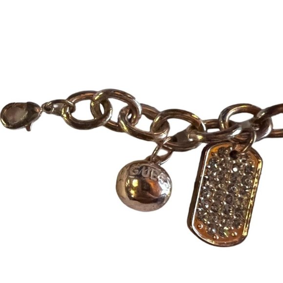 Guess Charm Bracelet Silver and Gold Tone Accessory Fashion Jewelry - Picture 4 of 9